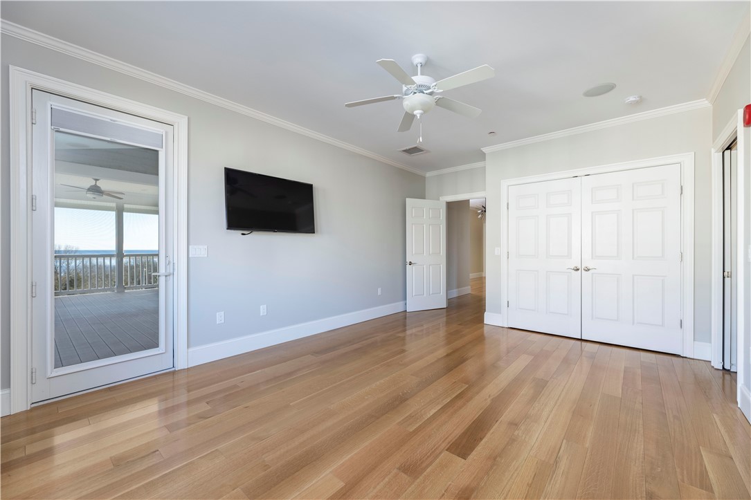 5 Compass Way, Unit C302 Westerly, RI 02891 - Photo 18 of 31 Master bedroom with access to Covered Porch