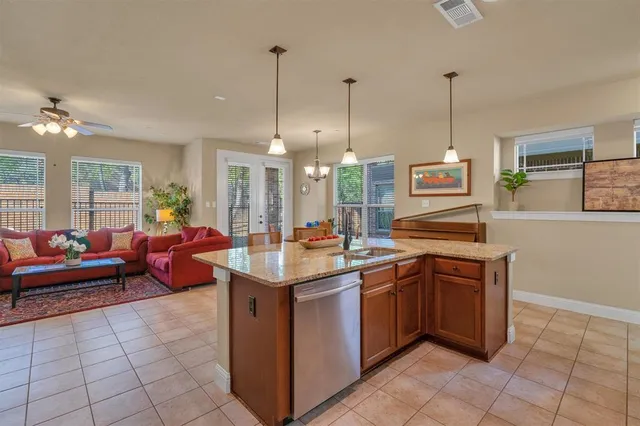 a outdoor dining room with furniture and window
