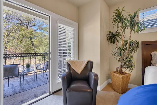 a view of a balcony with wooden floor