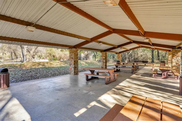 a view of a lake with a yard