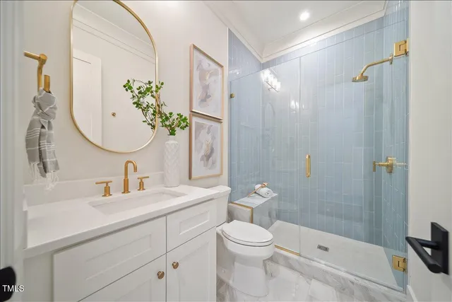 a bathroom with a shower a toilet and sink