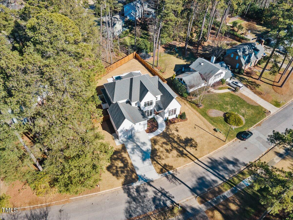 7516 Grist Mill Road Raleigh, NC 27615 - Photo 81 of 83 an aerial view of a house with a yard