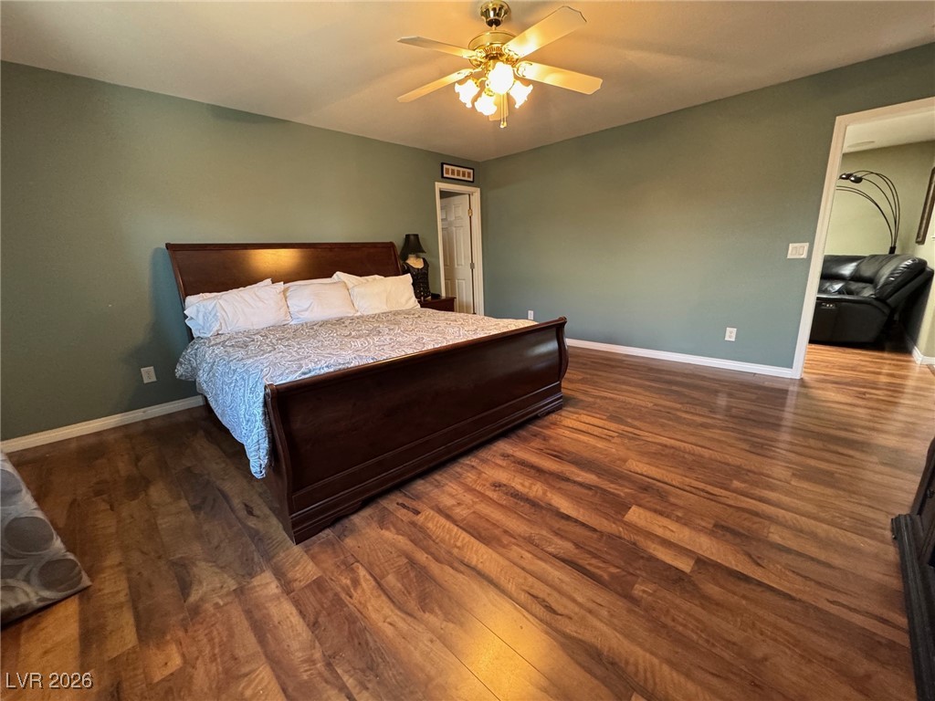 504 I Avenue Boulder City, NV 89005 - Photo 23 of 60 Bedroom featuring dark wood-style flooring and ceiling fan