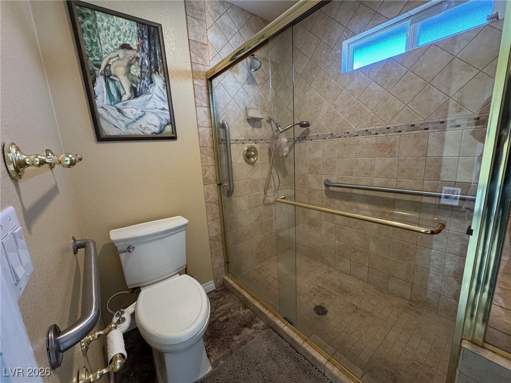 504 I Avenue Boulder City, NV 89005 - Photo 28 of 60 Bathroom with a stall shower and a textured wall