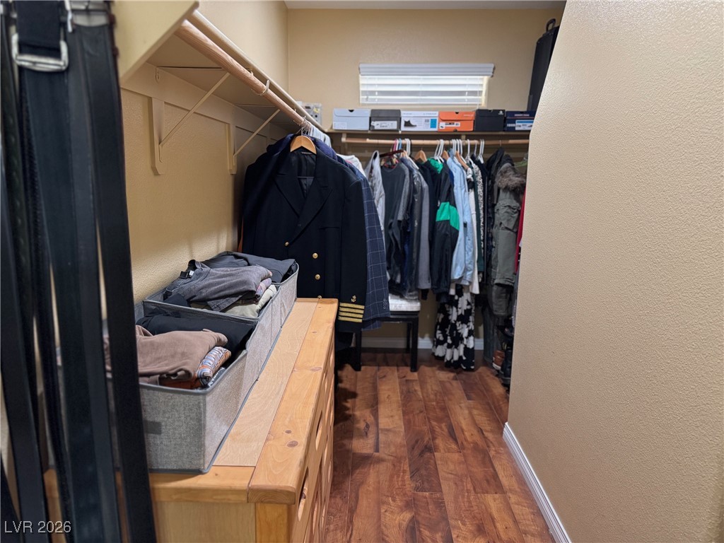 504 I Avenue Boulder City, NV 89005 - Photo 29 of 60 Walk in closet featuring dark wood-style floors