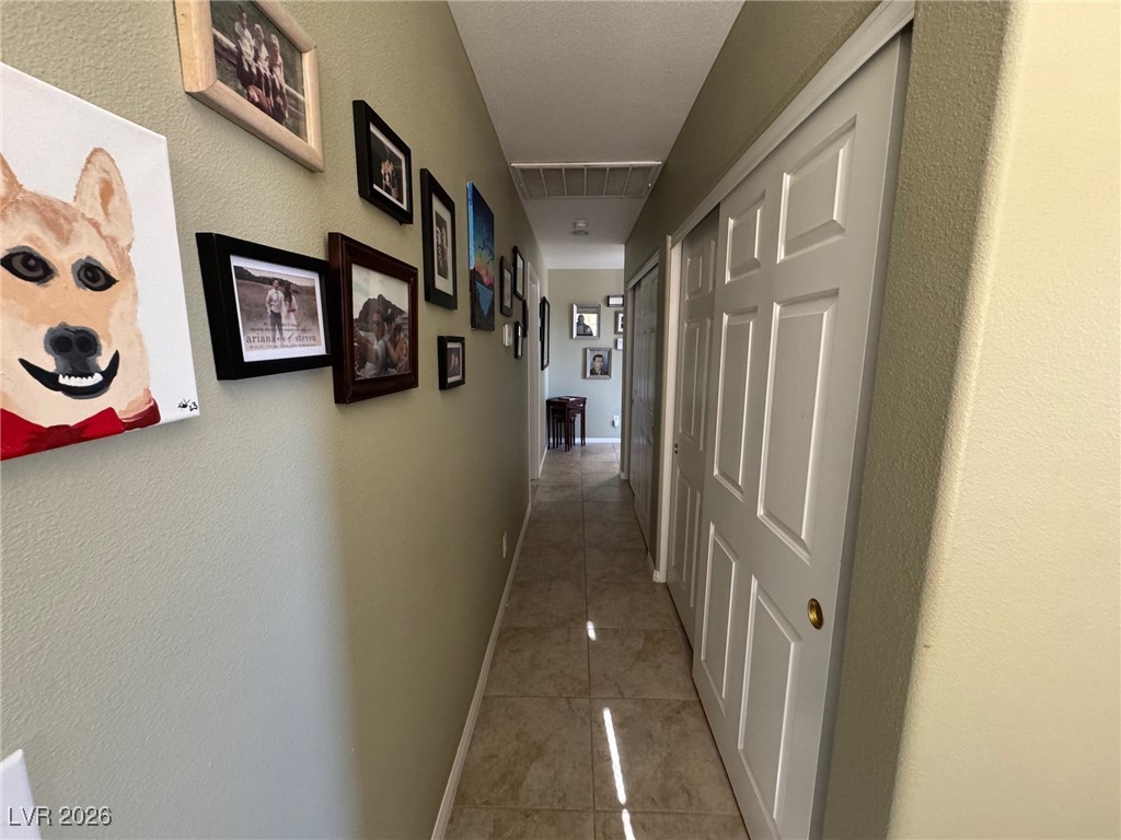 504 I Avenue Boulder City, NV 89005 - Photo 38 of 60 Hallway featuring a textured wall
