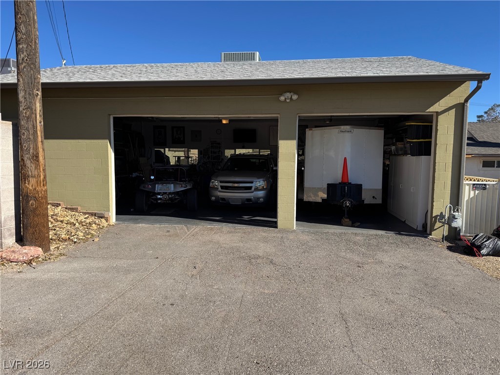504 I Avenue Boulder City, NV 89005 - Photo 54 of 60 Garage featuring driveway