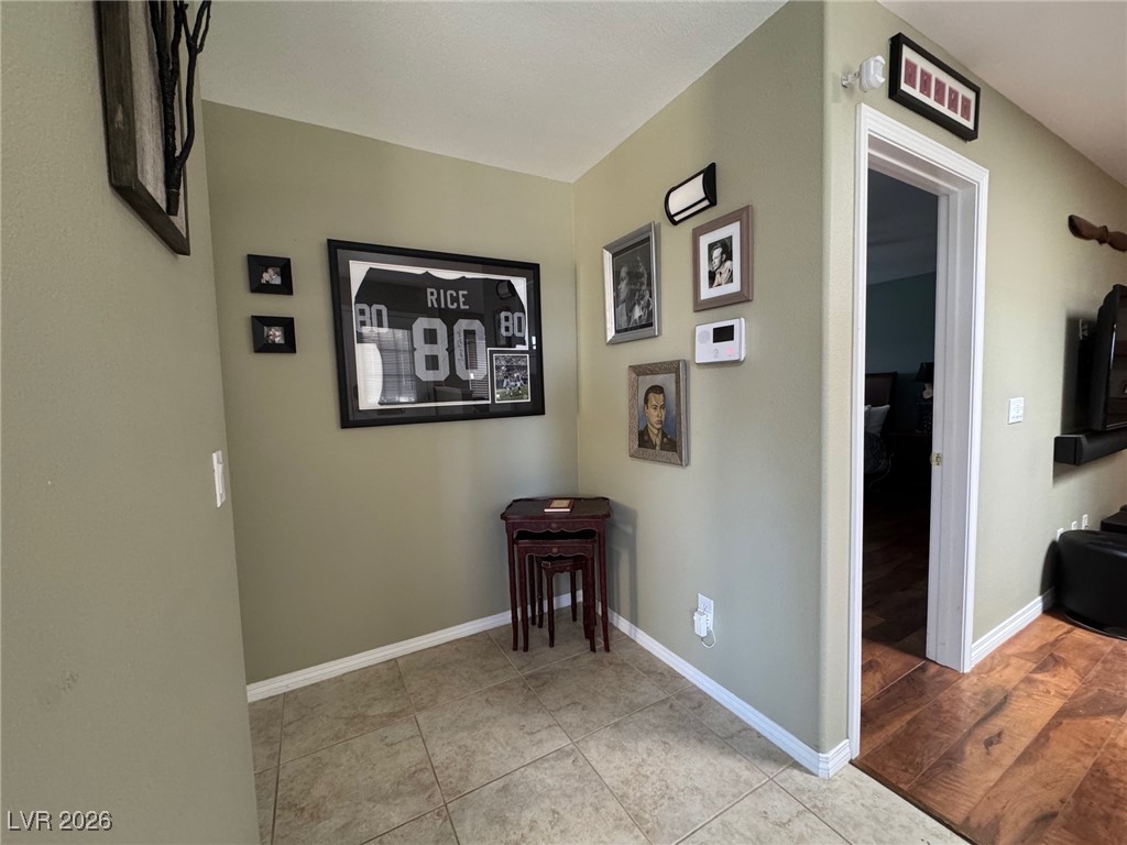 504 I Avenue Boulder City, NV 89005 - Photo 8 of 60 Hall featuring baseboards and light tile patterned floors
