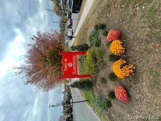 69 Harney Road, Unit 6B Scarsdale, NY 10583 - Photo 9 of 11 a street view with couple of cars parked