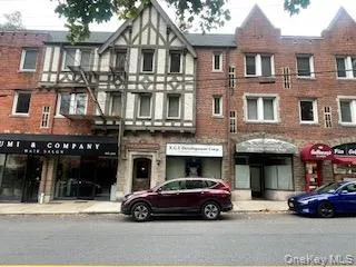 a car parked in front of a building