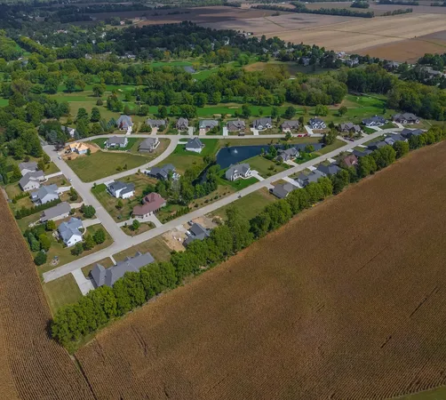 a view of a street with a yard