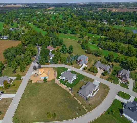 a view of a pool with a yard
