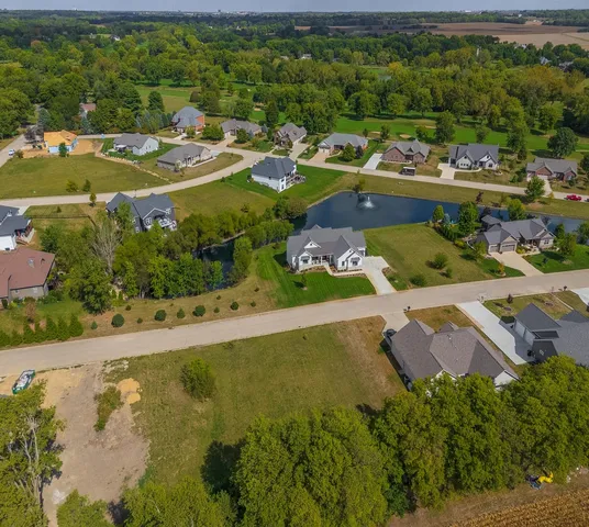 an aerial view of a house with a garden