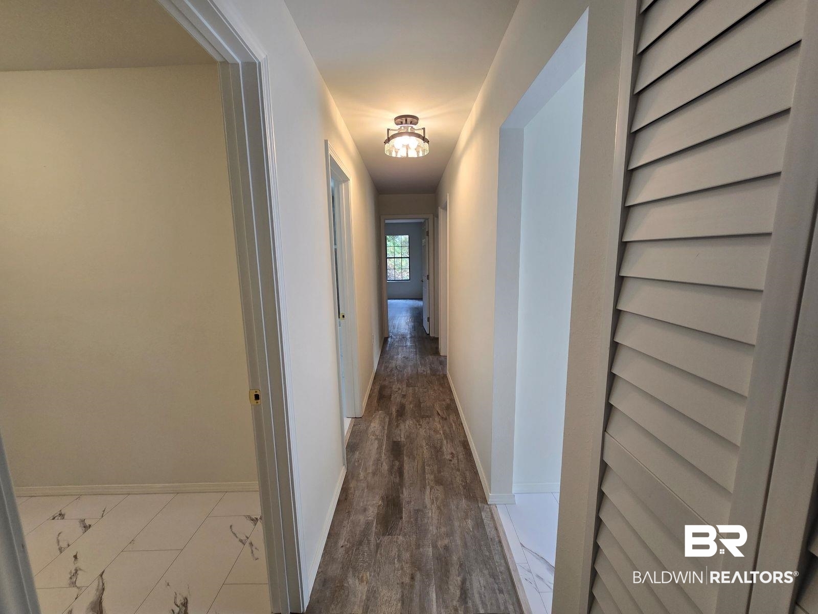 1600 Blair Road Brewton, AL 36426 - Photo 8 of 15 Hall featuring hardwood / wood-style floors