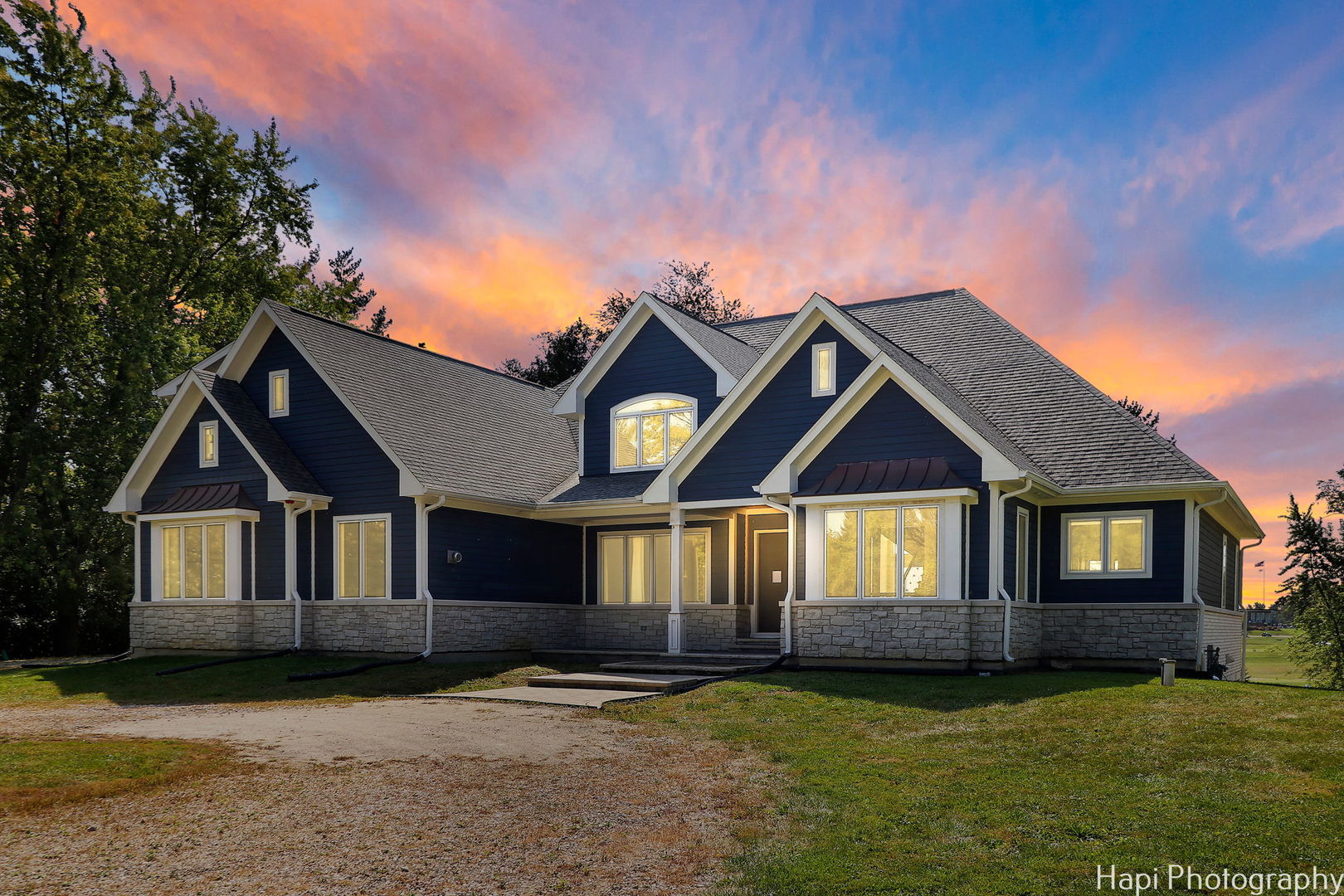 4285 Hilltop Road Long Grove, IL 60047 - Photo 1 of 1 a front view of a house with a garden and yard