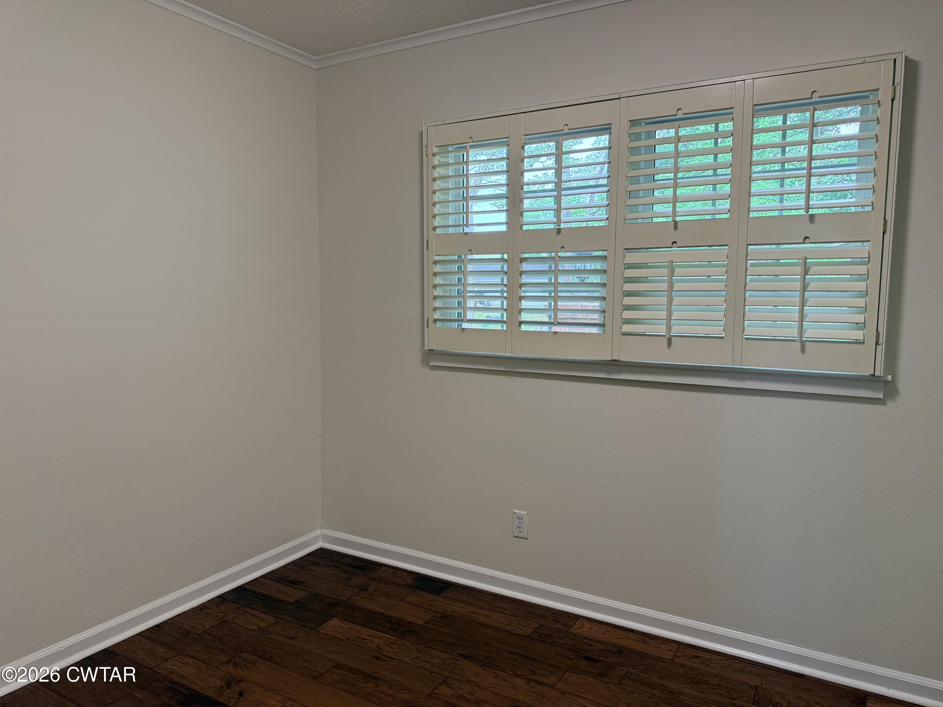 261 Lackey Lane Ripley, TN 38063 - Photo 13 of 48 a view of a small space with wooden floor and a window