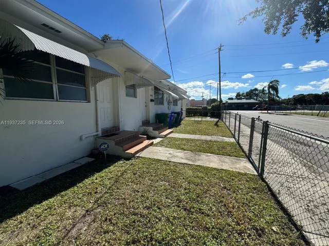 a view of a house with swimming pool