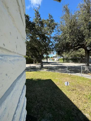 a view of a swimming pool with an outdoor space