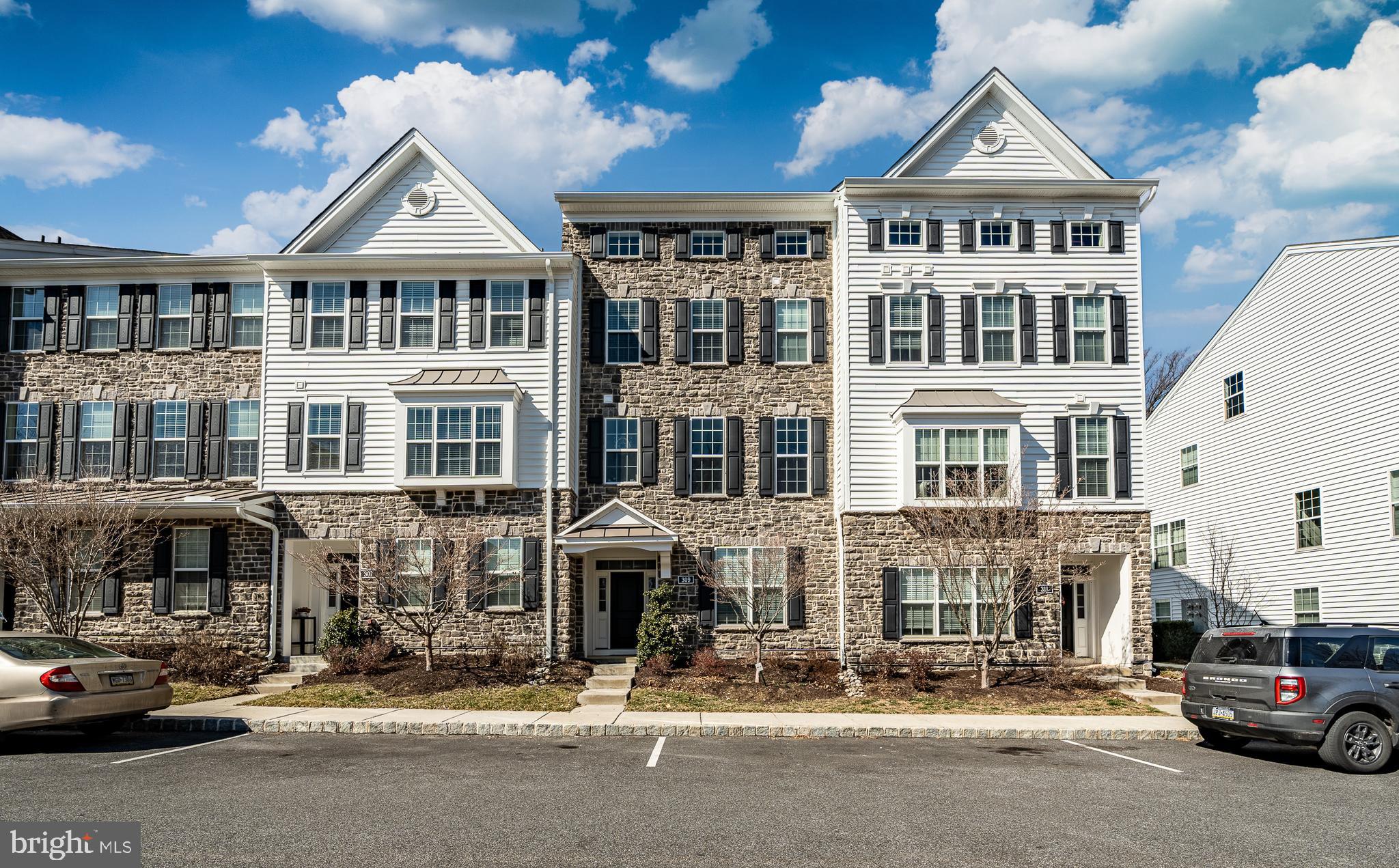 309 Murray Lane Springfield, PA 19064 - Photo 1 of 47 a front view of a building with street view