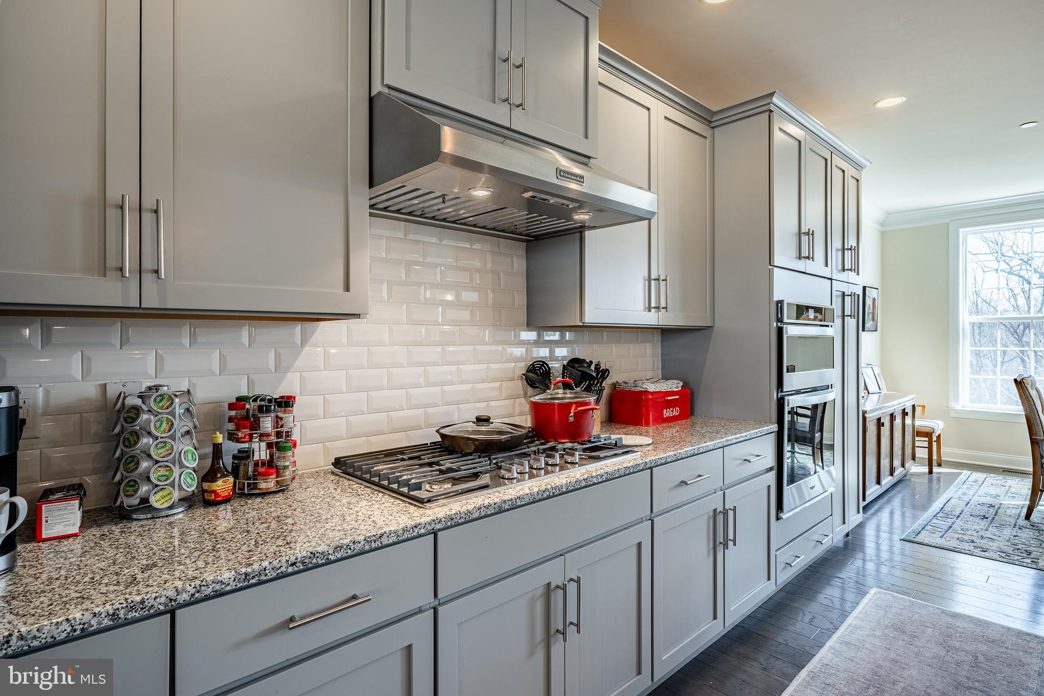 309 Murray Lane Springfield, PA 19064 - Photo 11 of 47 a kitchen with stainless steel appliances granite countertop a sink dishwasher stove and cabinets