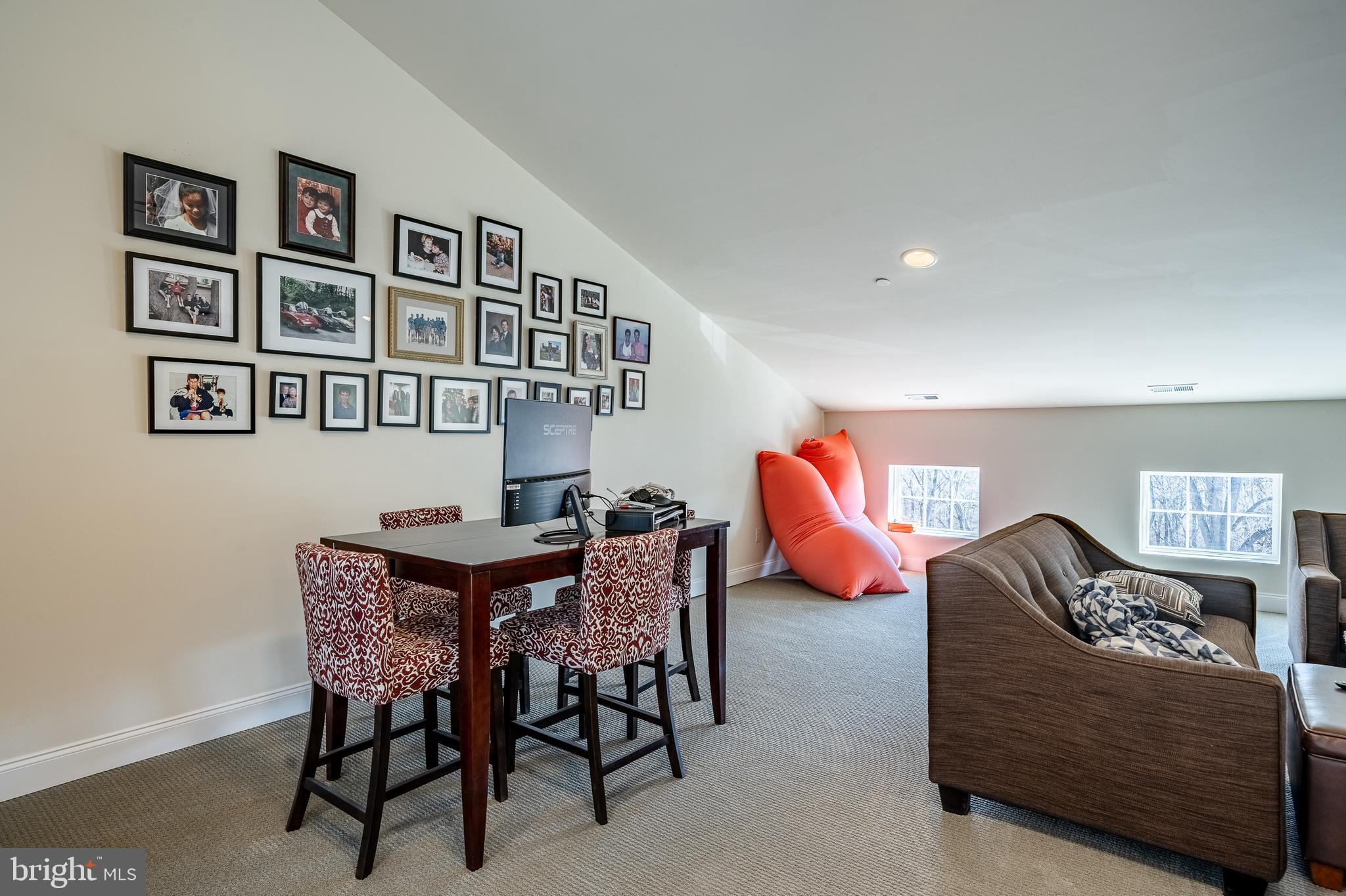 309 Murray Lane Springfield, PA 19064 - Photo 18 of 47 a living room with furniture a rug and a lamp