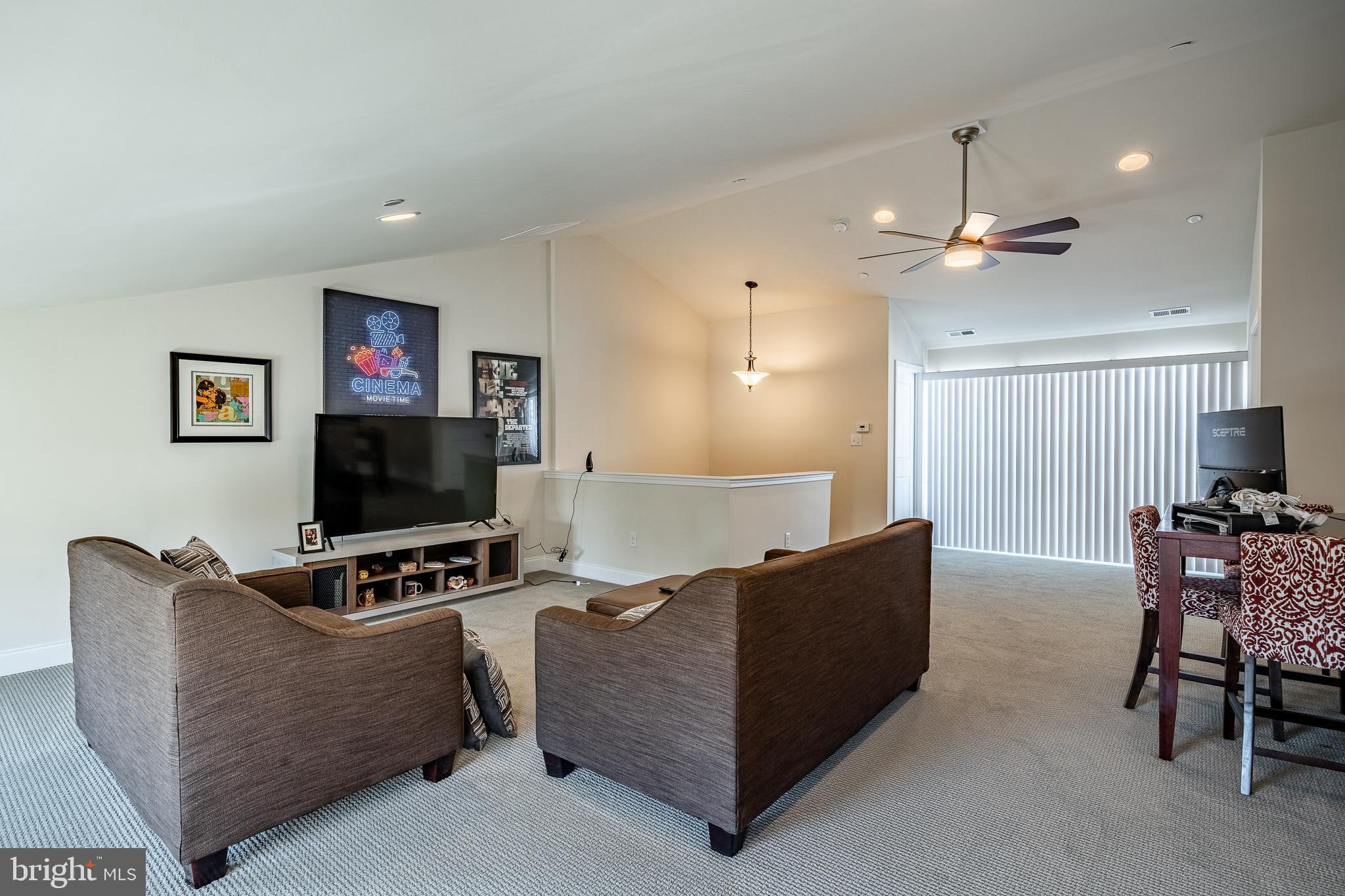 309 Murray Lane Springfield, PA 19064 - Photo 19 of 47 a living room with furniture and a flat screen tv