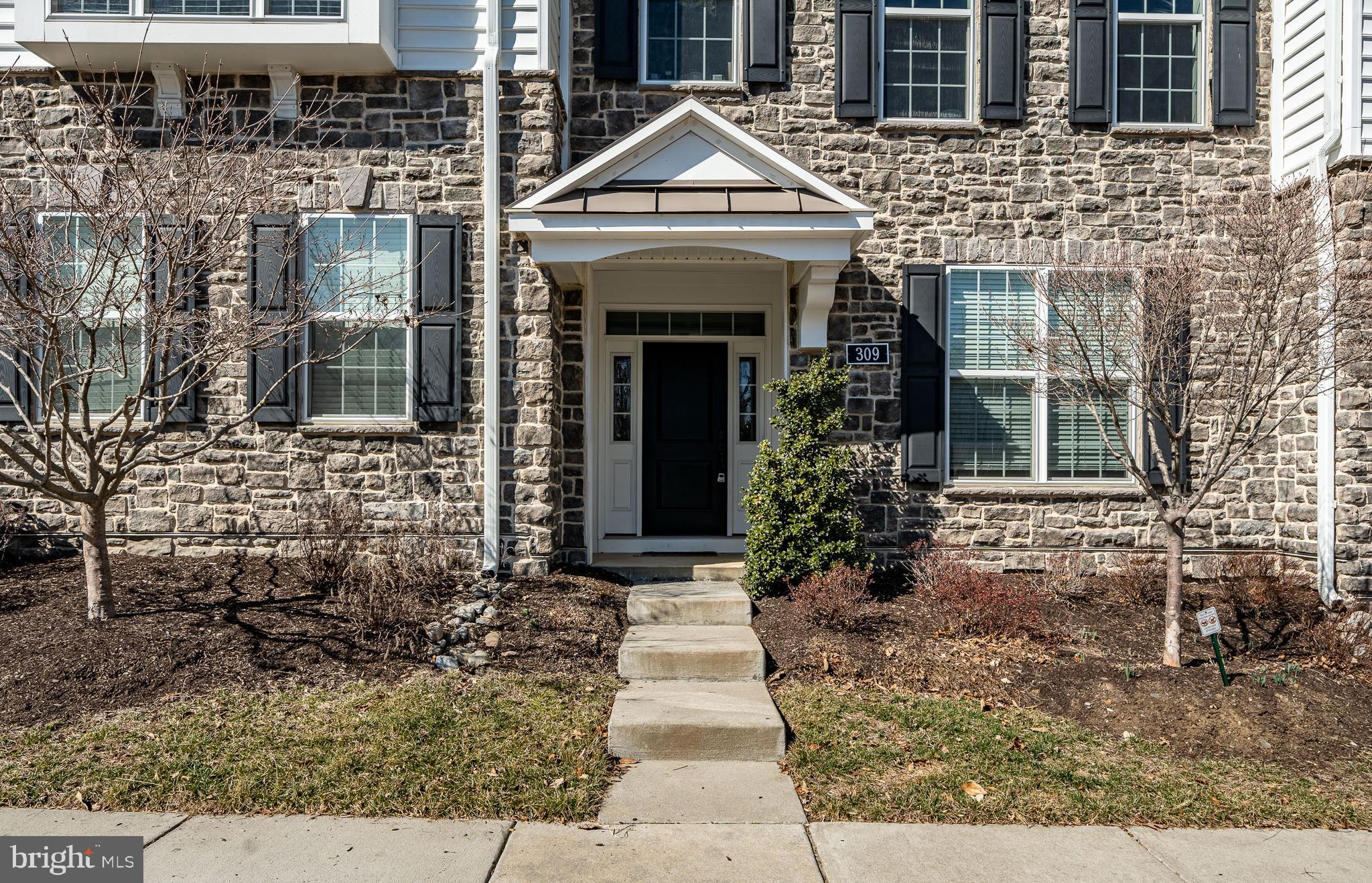 309 Murray Lane Springfield, PA 19064 - Photo 2 of 47 a front view of a house with yard