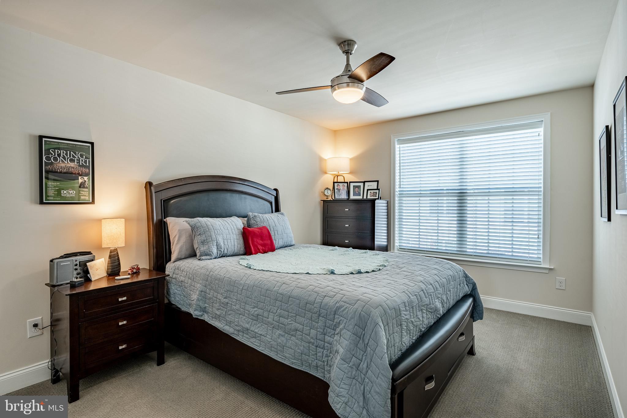 309 Murray Lane Springfield, PA 19064 - Photo 28 of 47 a bedroom with a bed and wooden floor