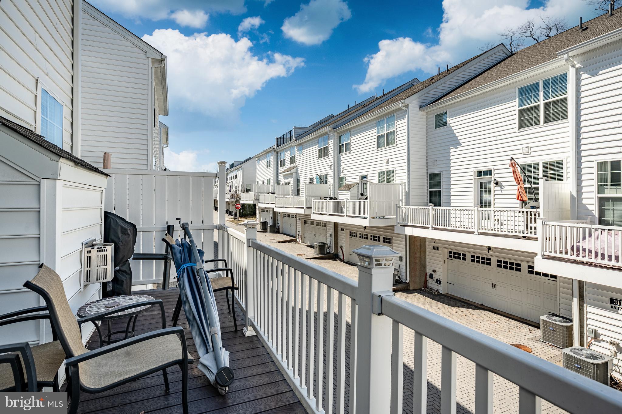 309 Murray Lane Springfield, PA 19064 - Photo 33 of 47 a view of a chairs and table in the balcony