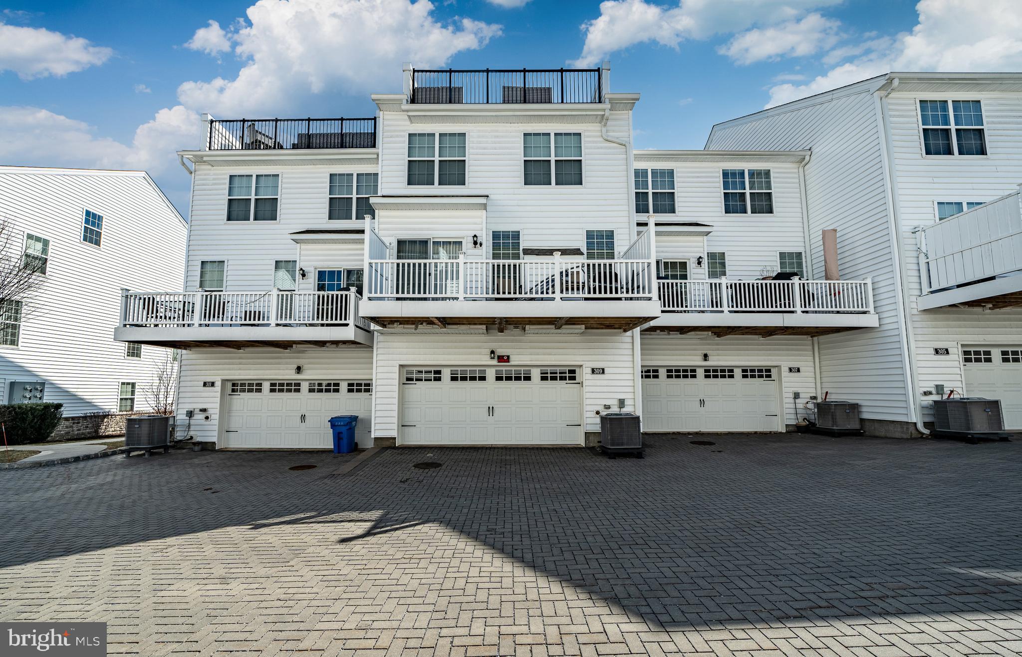 309 Murray Lane Springfield, PA 19064 - Photo 36 of 47 a view of a street with cars