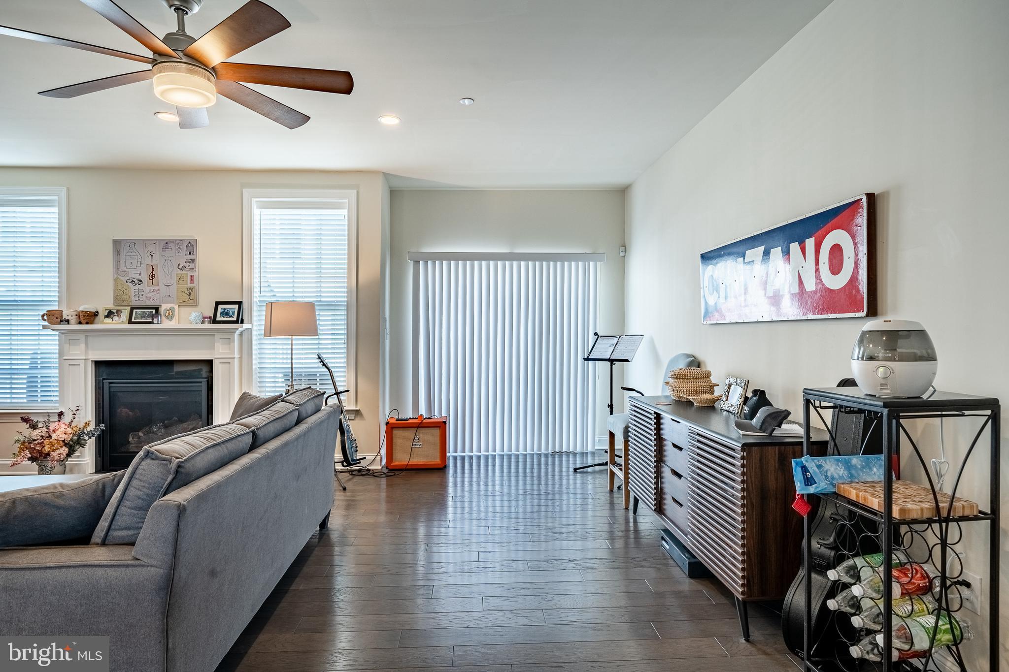 309 Murray Lane Springfield, PA 19064 - Photo 8 of 47 a living room with furniture and a fireplace
