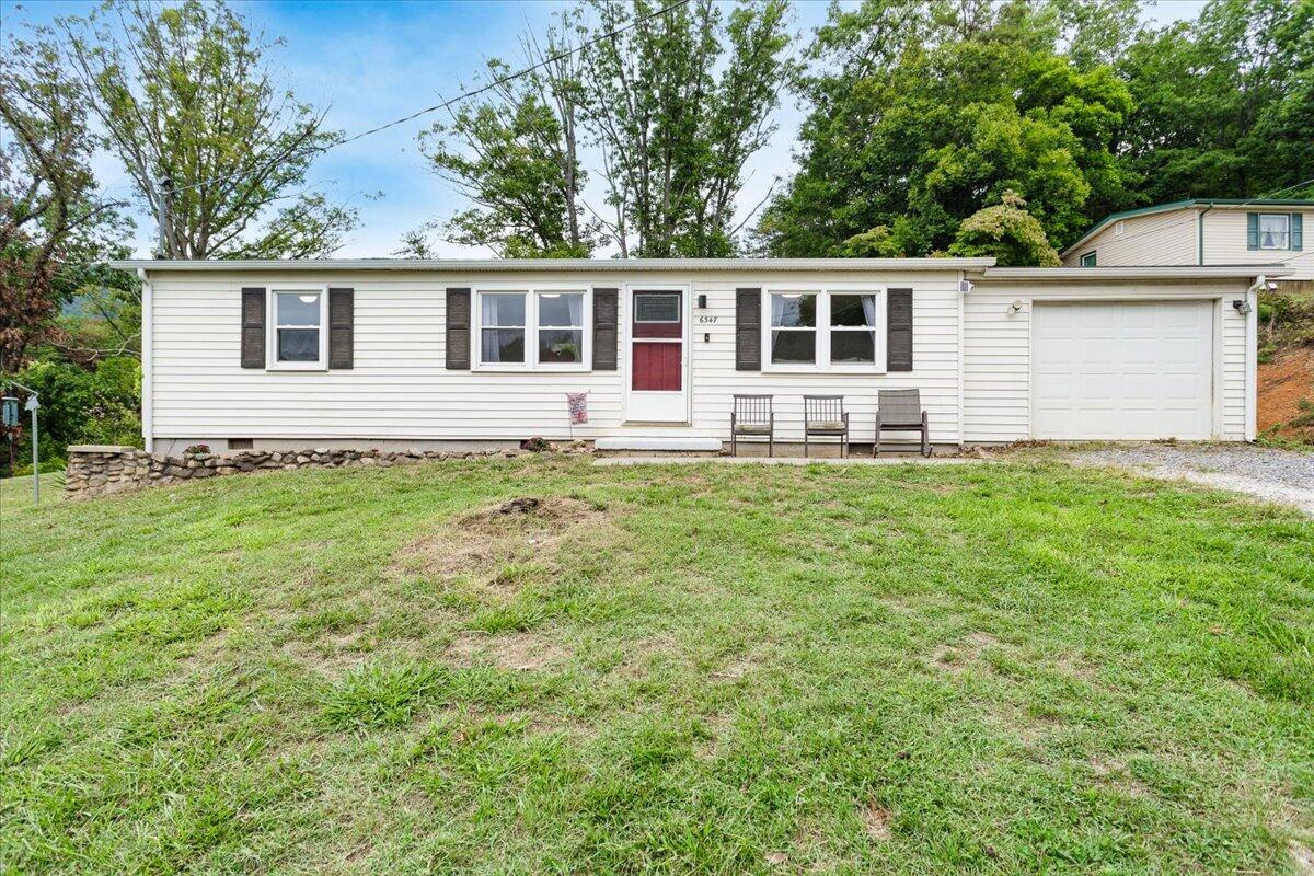 6347 Meacham Road Salem, VA 24153 - Photo 1 of 26 a front view of a house with a garden