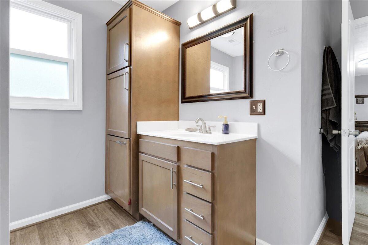6347 Meacham Road Salem, VA 24153 - Photo 20 of 26 a bathroom with a sink vanity and a mirror