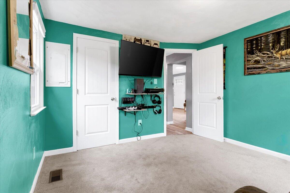 6347 Meacham Road Salem, VA 24153 - Photo 25 of 26 a view of a hallway with a livingroom and front door