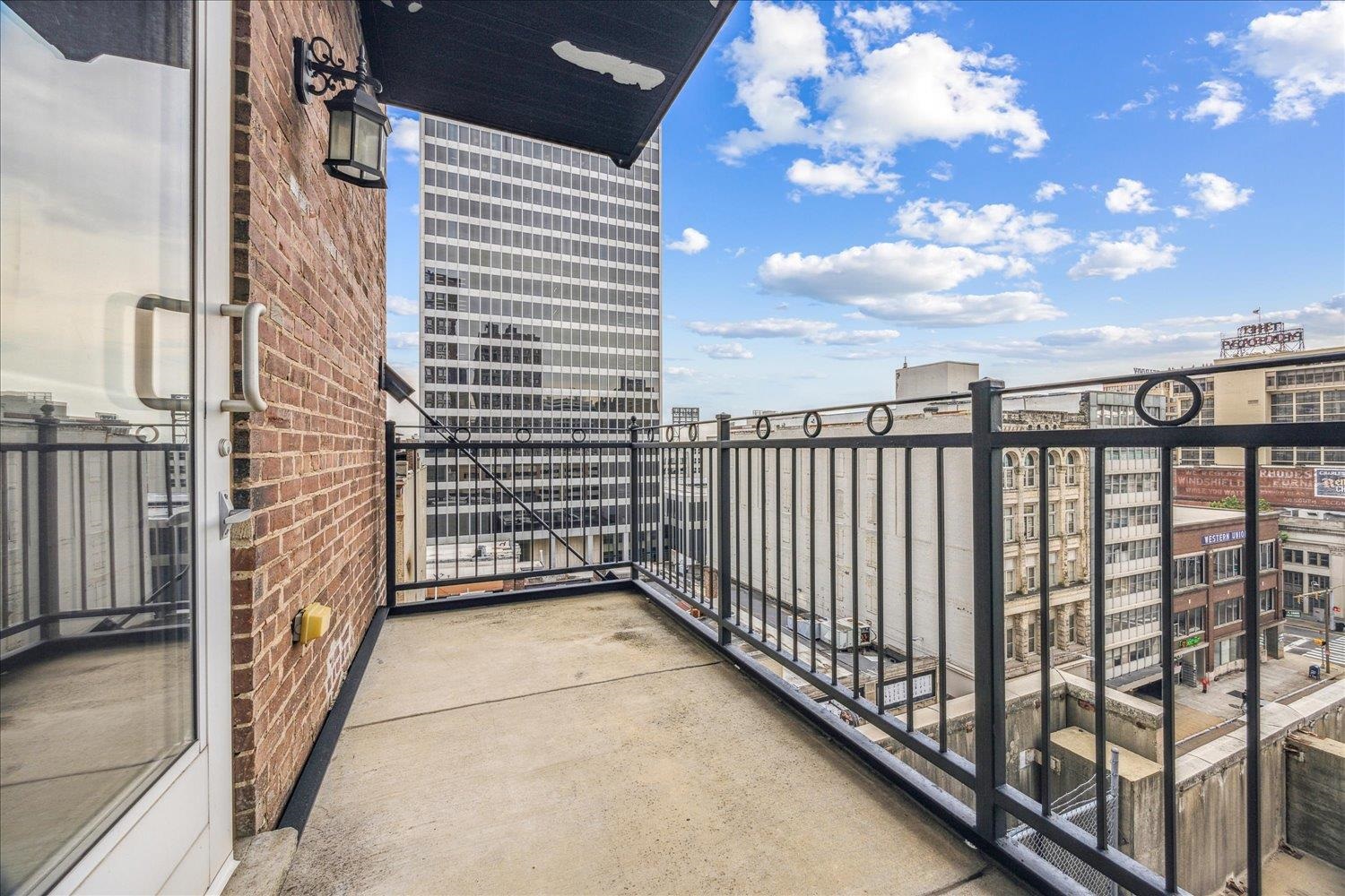 127 Madison Avenue, Unit 602 Memphis, TN 38103 - Photo 25 of 25 Balcony featuring a view of city