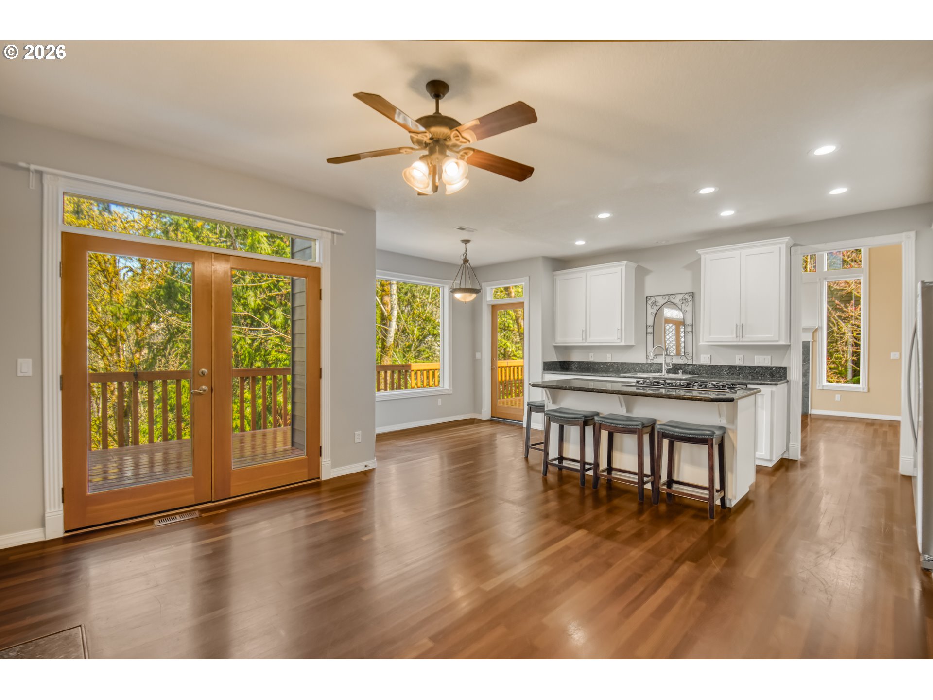 9583 Northwest Randall Lane Portland, OR 97229 - Photo 15 of 41 a view of kitchen with wooden floor and a window