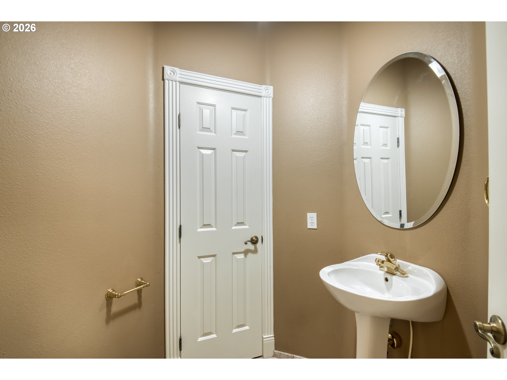 9583 Northwest Randall Lane Portland, OR 97229 - Photo 16 of 41 a bathroom with a sink and a mirror