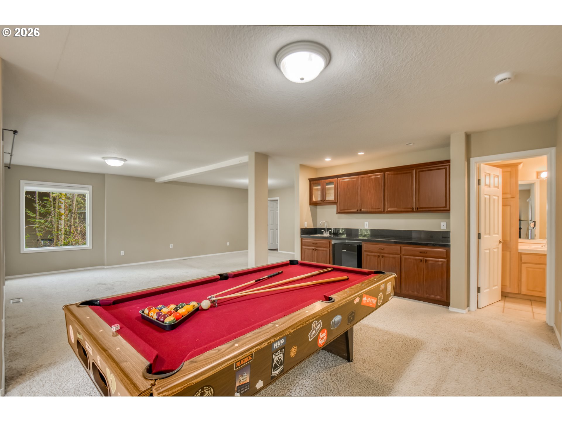 9583 Northwest Randall Lane Portland, OR 97229 - Photo 28 of 41 a room with pool table and flat screen tv