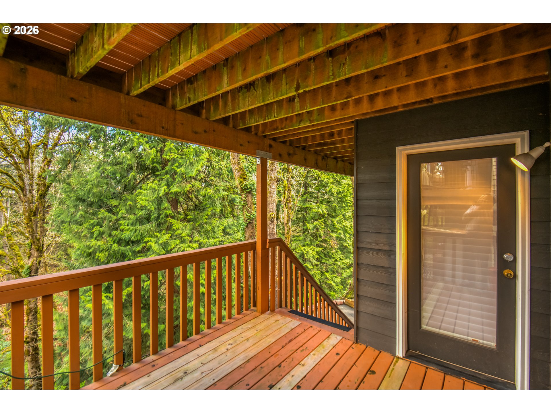9583 Northwest Randall Lane Portland, OR 97229 - Photo 31 of 41 a balcony with an outdoor space