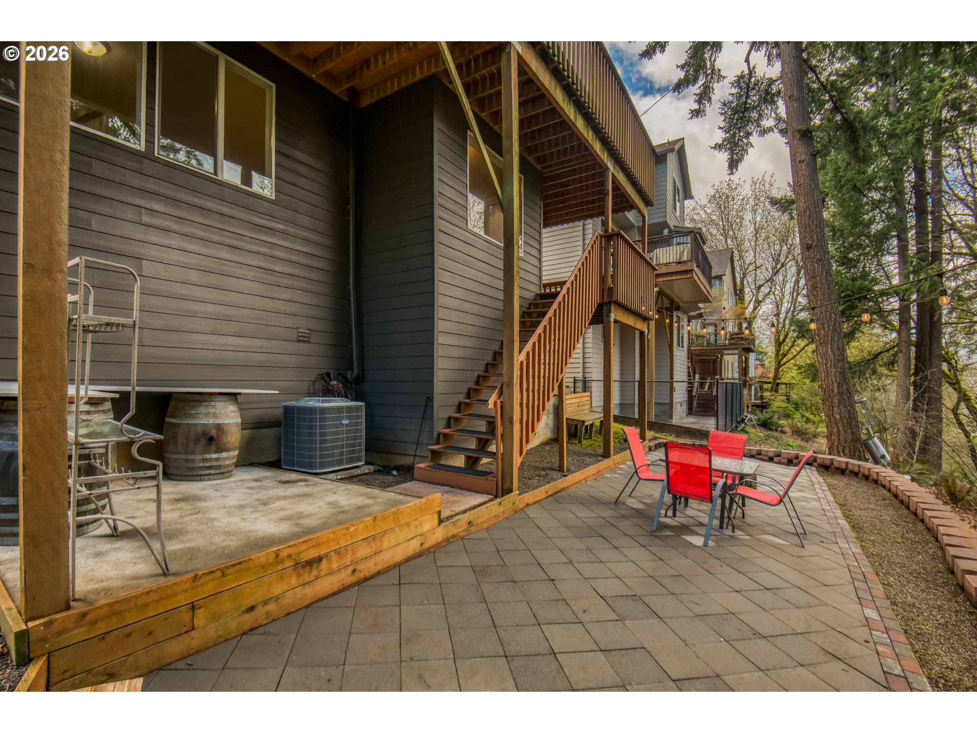 9583 Northwest Randall Lane Portland, OR 97229 - Photo 32 of 41 a view of outdoor space deck and floor to ceiling window