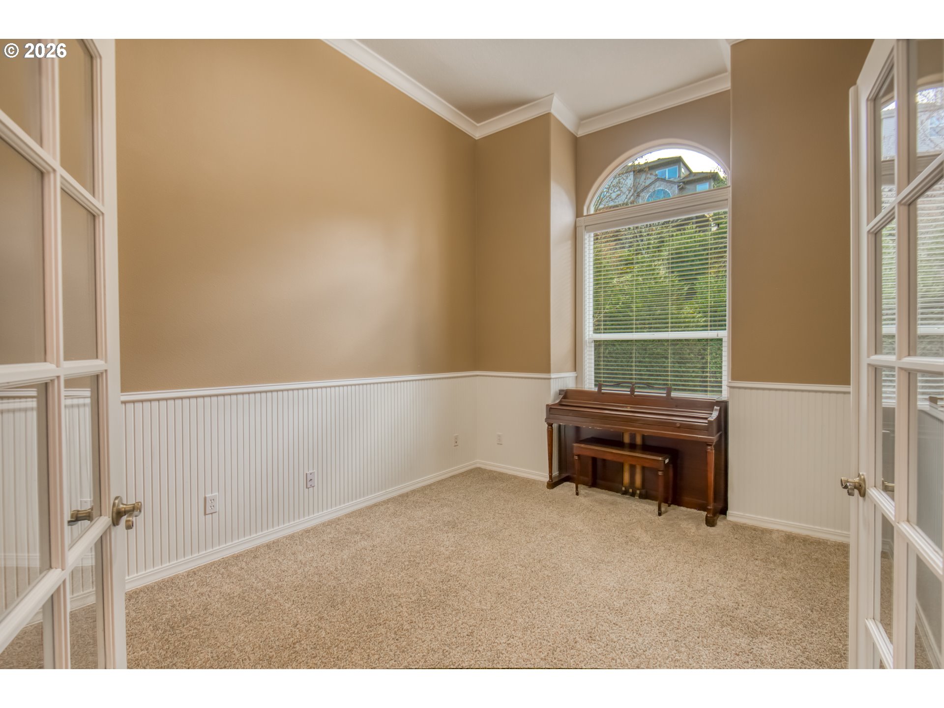 9583 Northwest Randall Lane Portland, OR 97229 - Photo 4 of 41 view of room with window and cabinet