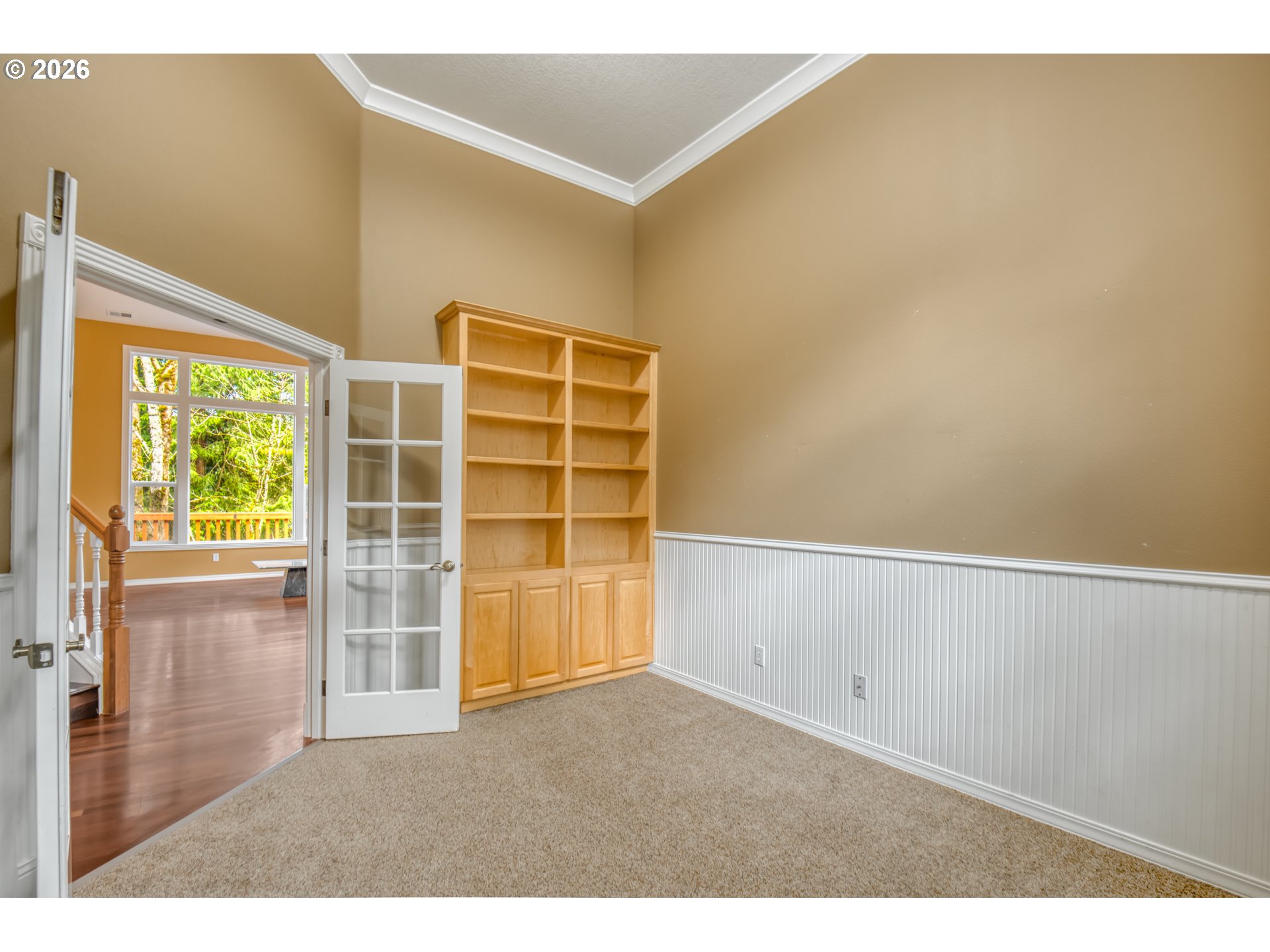 9583 Northwest Randall Lane Portland, OR 97229 - Photo 5 of 41 a view of an empty room with a window