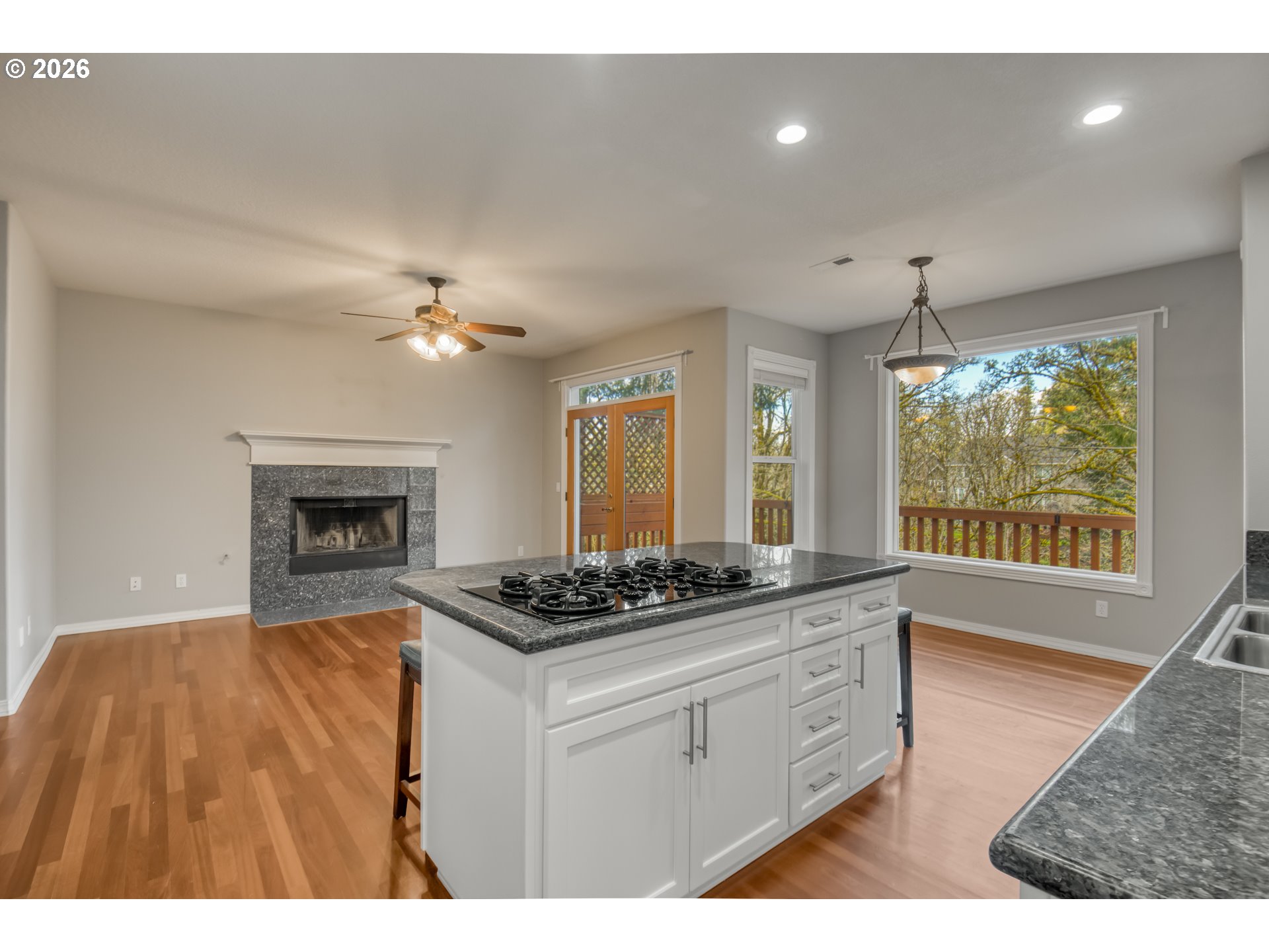 9583 Northwest Randall Lane Portland, OR 97229 - Photo 10 of 41 a kitchen that has a lot of cabinets in it