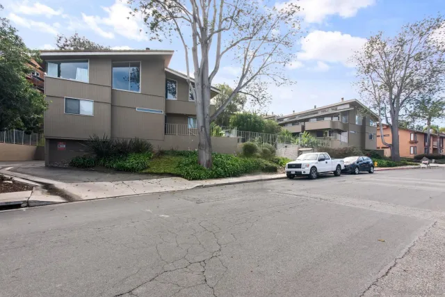 a car parked in front of a building