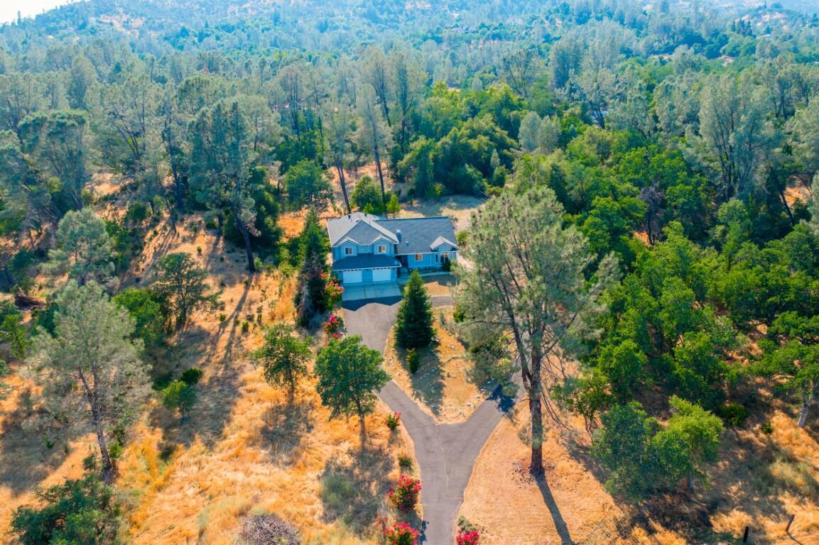 8418 Placer Road Redding, CA 96001 - Photo 36 of 47 an aerial view of a house with yard