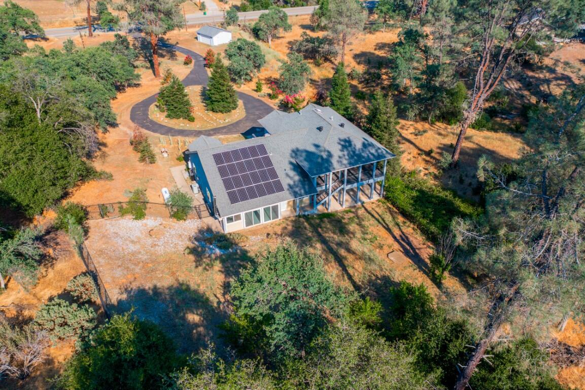 8418 Placer Road Redding, CA 96001 - Photo 43 of 47 an aerial view of residential house with outdoor space and trees all around