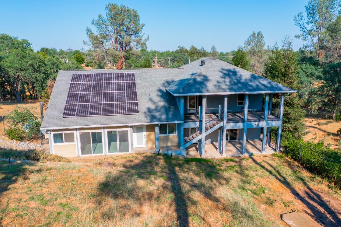 8418 Placer Road Redding, CA 96001 - Photo 45 of 47 a front view of a house with a yard