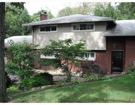 1332 Coraopolis Heights Road Coraopolis, PA 15108 - Photo 1 of 18 Exterior Front. Beautifully landscaped multi-level home with expansive yard. The curving lighted path leads to the covered entry and mahogany craftsman style front door.