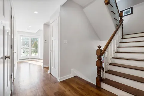 a bed room with furniture and a window