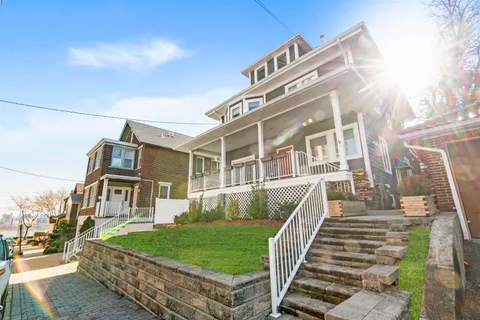 a view of balcony with wooden floor